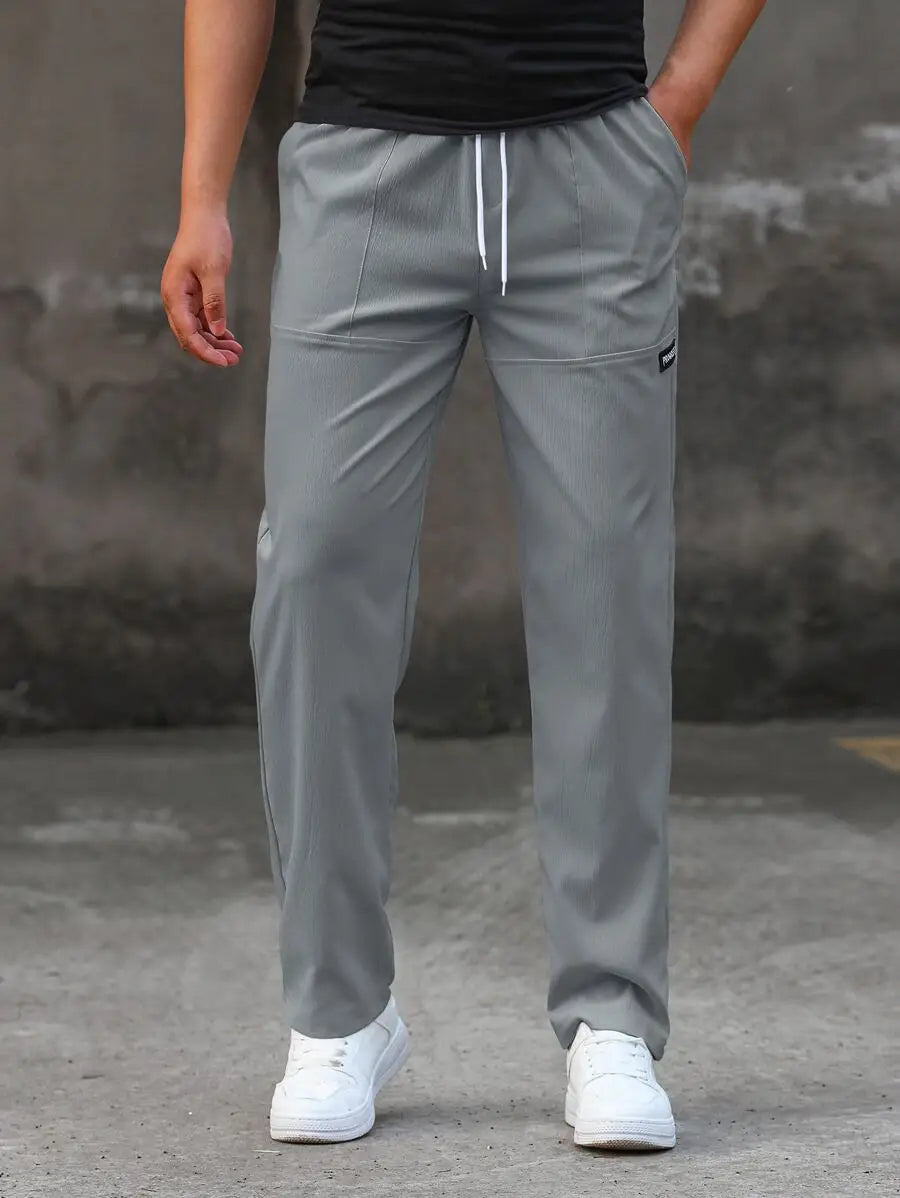 Men's Drawstring Waist Tapered Casual Pants With Patch Detail